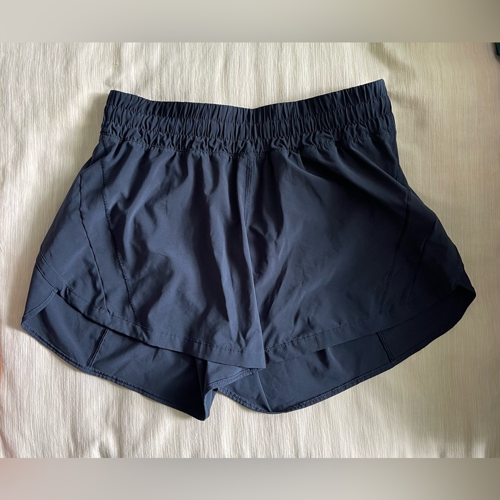 Navy blue lululemon track that mid-rise lined short 5”